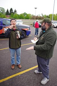 Jim Cox and Pete Winters eat some vittles at Rallyfest.