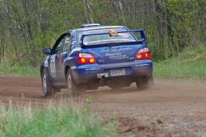 The Carl Siegler/ David Goodman Subaru WRX STi prepare for a left-hander on stage one.