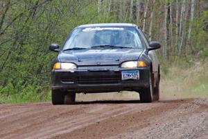 Matt Himes / Silas Himes at speed on stage one in their Honda Civic.