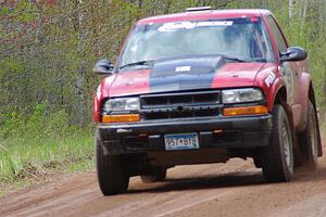 The Jim Cox / Mark Holden Chevrolet S-10 at speed on stage one.