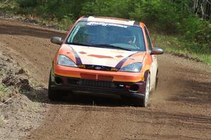 Dillon Van Way / Ben Slocum drift through a sweeper on stage two in their Ford Focus.