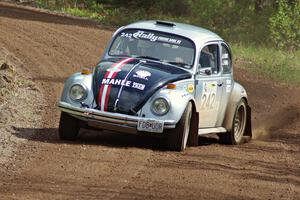 Mark Huebbe / John Huebbe power their VW Beetle out of a sweeper on stage two.