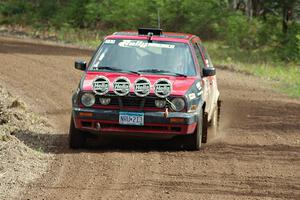 John Kimmes / Greg Smith drift through a sweeper on stage two in their VW GTI.