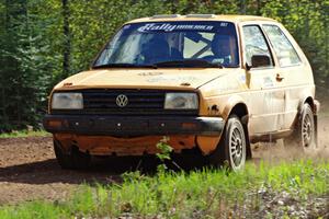 The Chad Eixenberger / Chris Gordon VW Golf through a fast sweeper on stage three.