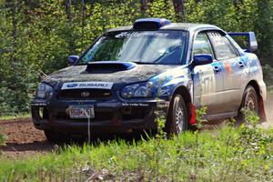 The Carl Siegler/ David Goodman Subaru WRX STi on a sweeper on stage three.