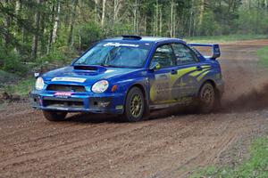 Janusz Topor / Michal Kaminski set up for a sweeper on stage four in their Subaru WRX STi.