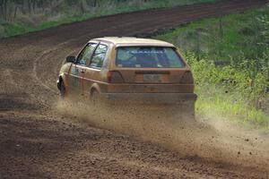 The Chad Eixenberger / Chris Gordon VW Golf drifts through an uphill sweeper on stage four.