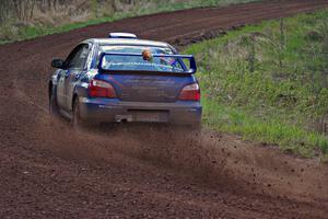 The Carl Siegler/ David Goodman Subaru WRX STi drifts through a sweeper on the final stage.