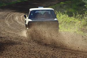 The Jim Scray / Colin Vickman Datsun 510 drifts through a sweeper on stage four.