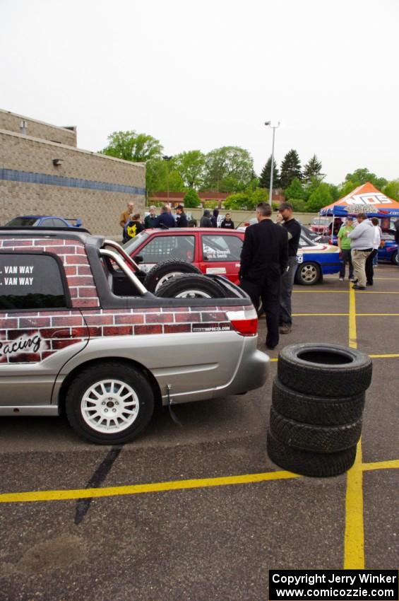 The Sullivan Van Way / Angela Van Way Subaru Brat with a stack of rally tires at the back.