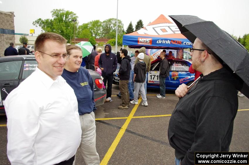 Steve Gingras, Amy Springer and Breon Nagy converse at Rallyfest.