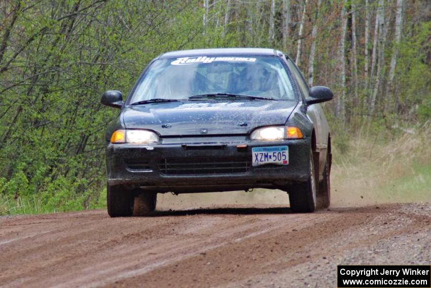 Matt Himes / Silas Himes at speed on stage one in their Honda Civic.