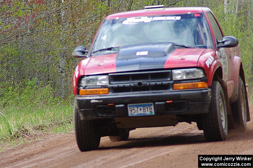 The Jim Cox / Mark Holden Chevrolet S-10 at speed on stage one.