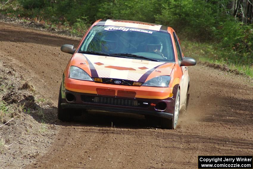 Dillon Van Way / Ben Slocum drift through a sweeper on stage two in their Ford Focus.