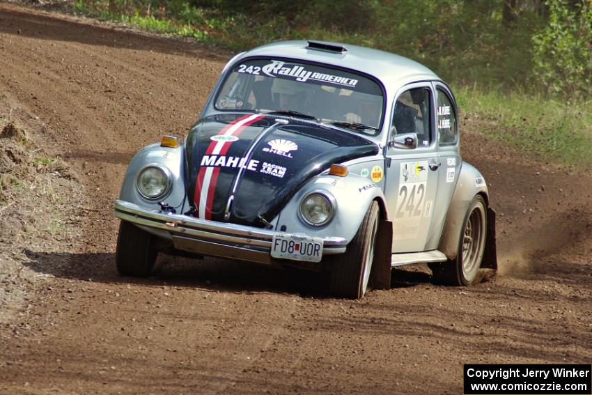 Mark Huebbe / John Huebbe power their VW Beetle out of a sweeper on stage two.