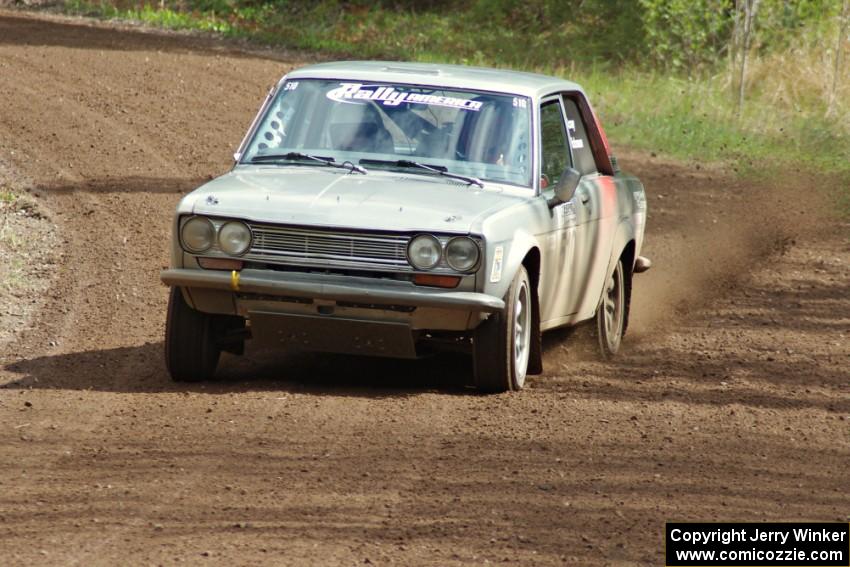 Jim Scray / Colin Vickman drift through a sweeper on stage two in their Datsun 510.