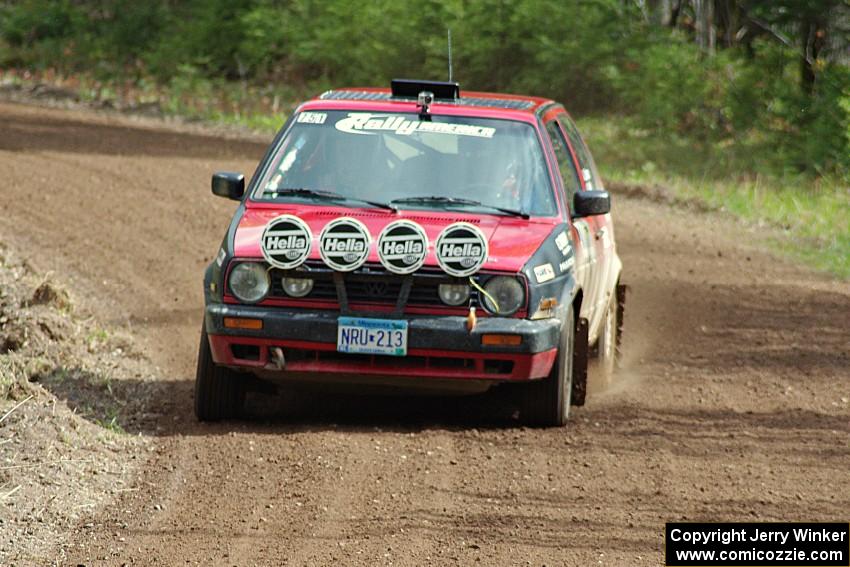 John Kimmes / Greg Smith drift through a sweeper on stage two in their VW GTI.