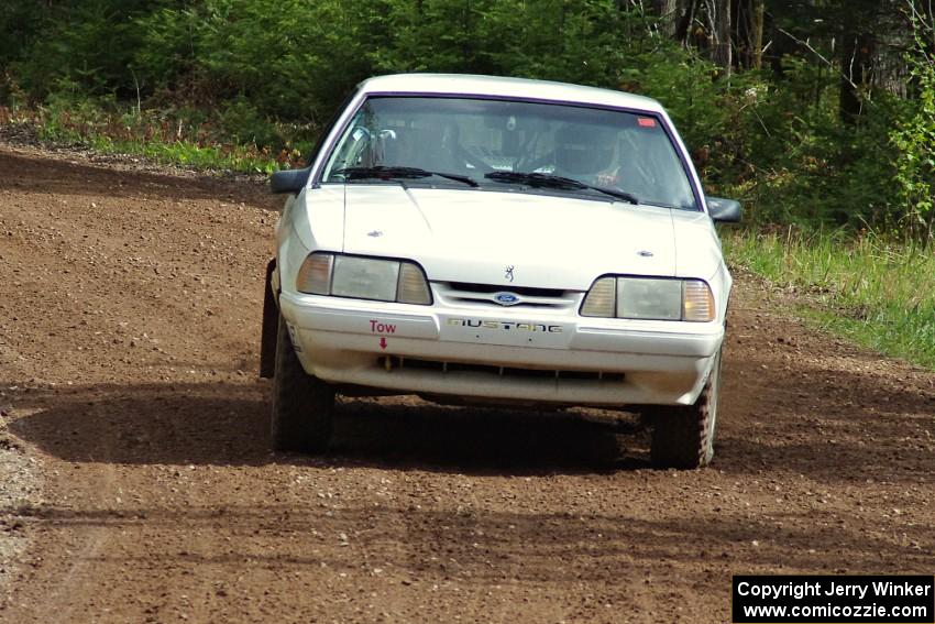 Bonnie Stoehr / Dave Walton drift their Ford Mustang through a corner on stage two.