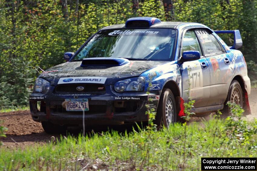 The Carl Siegler/ David Goodman Subaru WRX STi on a sweeper on stage three.