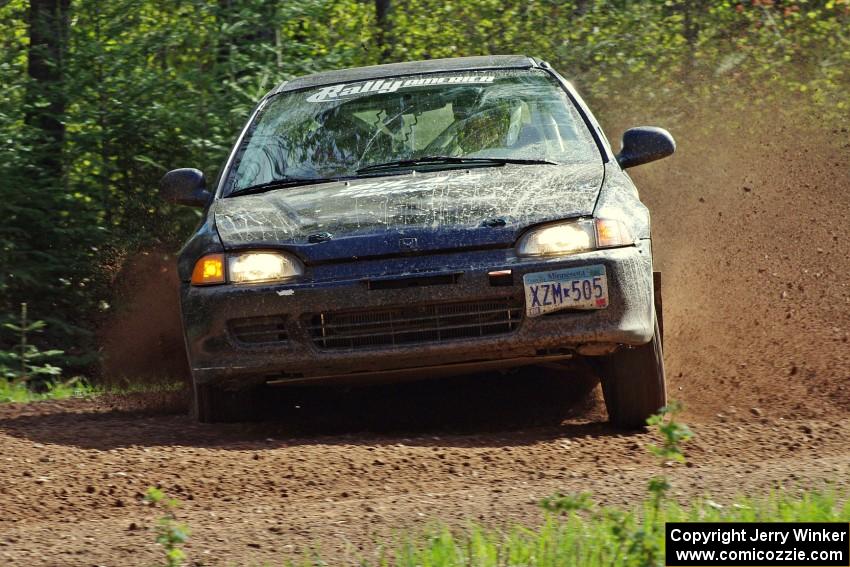 The Silas Himes / Matt Himes Honda Civic drifts through a huge sweeper on stage three.