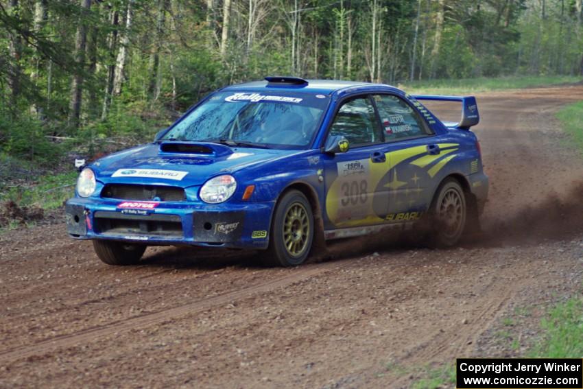 Janusz Topor / Michal Kaminski set up for a sweeper on stage four in their Subaru WRX STi.