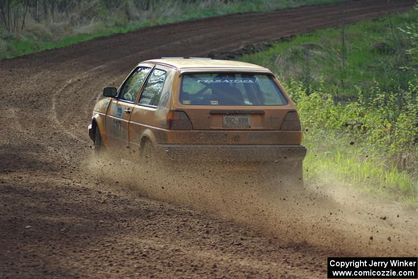 The Chad Eixenberger / Chris Gordon VW Golf drifts through an uphill sweeper on stage four.