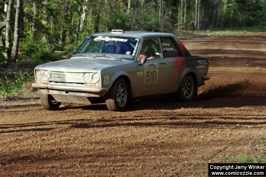 The Jim Scray / Colin Vickman Datsun 510 sets up for a sweeper on stage four.