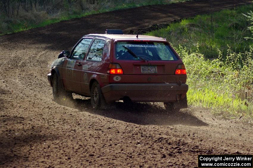 The John Kimmes / Greg Smith VW GTI through an uphill sweeper on stage four.