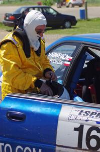 Bartek Stypa readies himself to navigate for Kazimierz Pudelek in his Subaru Impreza