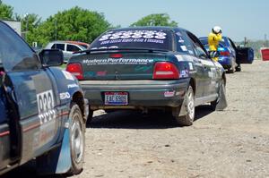 The Chris O'Driscoll / Lori O'Driscoll Honda CRX and Chris Greenhouse / Elliott Sherwood Plymouth Neon line up for the start.