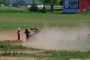 The Anthony Israelson / Jason Standage Subaru Impreza passes the broken down Eagle Talon of Erik Hill / Tim Knorr.