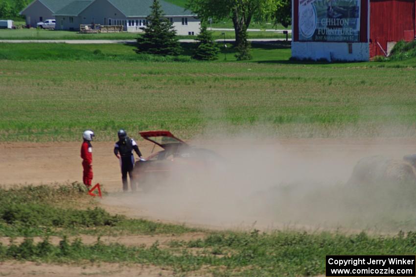 The Anthony Israelson / Jason Standage Subaru Impreza passes the broken down Eagle Talon of Erik Hill / Tim Knorr.