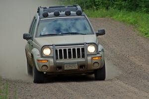 Mark Larson working med sweep in his Jeep