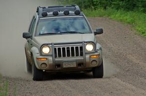 Mark Larson working med sweep in his Jeep