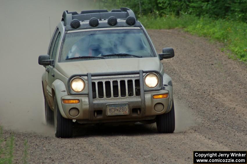 Mark Larson working med sweep in his Jeep