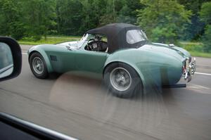 A REAL AC Cobra on the highway headed to the rally!