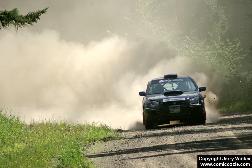 Carl Siegler / Dave Goodman Subaru WRX STi on SS2