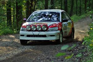 Jan Zedril / Jody Zedril in their Mitsubishi Lancer ES on SS1