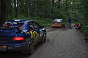 Matt Bushore / Andy Bushore, in their VW Jetta, start SS3 as the Piotr Fetela / Ray Vambuts Subaru Impreza STi waits.