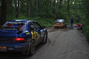 Matt Bushore / Andy Bushore, in their VW Jetta, start SS3 as the Piotr Fetela / Ray Vambuts Subaru Impreza STi waits.