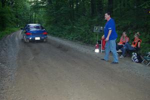 Piotr Fetela / Ray Vambuts, in their Subaru Impreza STi, leaves the start of SS3.