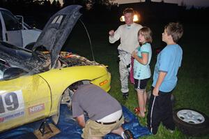 Chris Greenhouse explains rally to some kids.