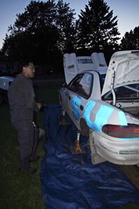 Al Kaumeheiwa works on the Henry Krolikowski / Cindy Krolikowski Subaru Impreza at Friday's service