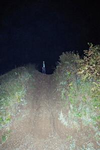 Tim Williams scouts photo spots atop the gravel mound.