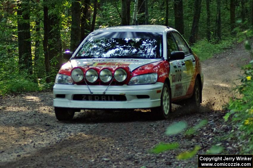 Jan Zedril / Jody Zedril in their Mitsubishi Lancer ES on SS1