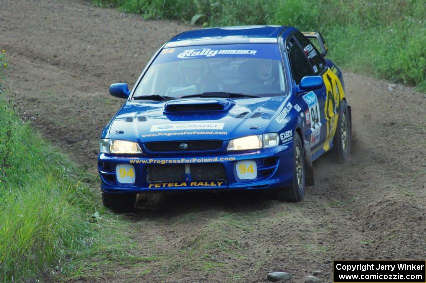 Piotr Fetela / Ray Vambuts in their Subaru Impreza STi on SS1
