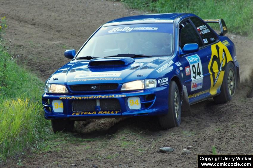 Piotr Fetela / Ray Vambuts in their Subaru Impreza STi on SS1