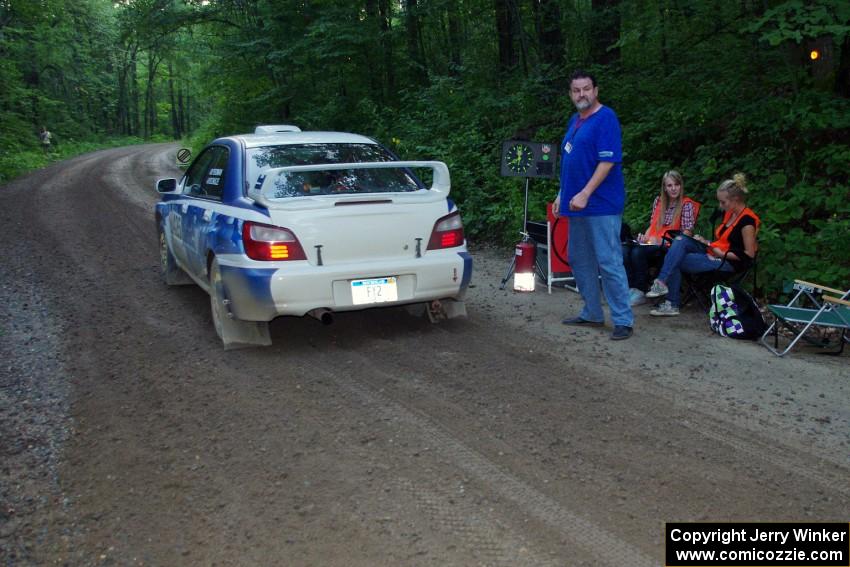 Adam Yeoman / Jordan Schulze, in their Subaru Impreza, leave the start of SS3.