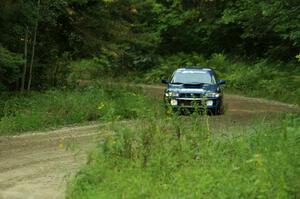 Piotr Fetela / Ray Vambuts in their Subaru Impreza STi on SS7