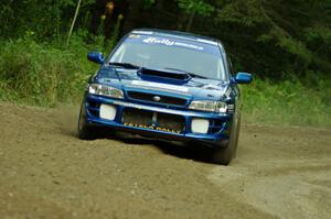 Piotr Fetela / Ray Vambuts in their Subaru Impreza STi on SS7